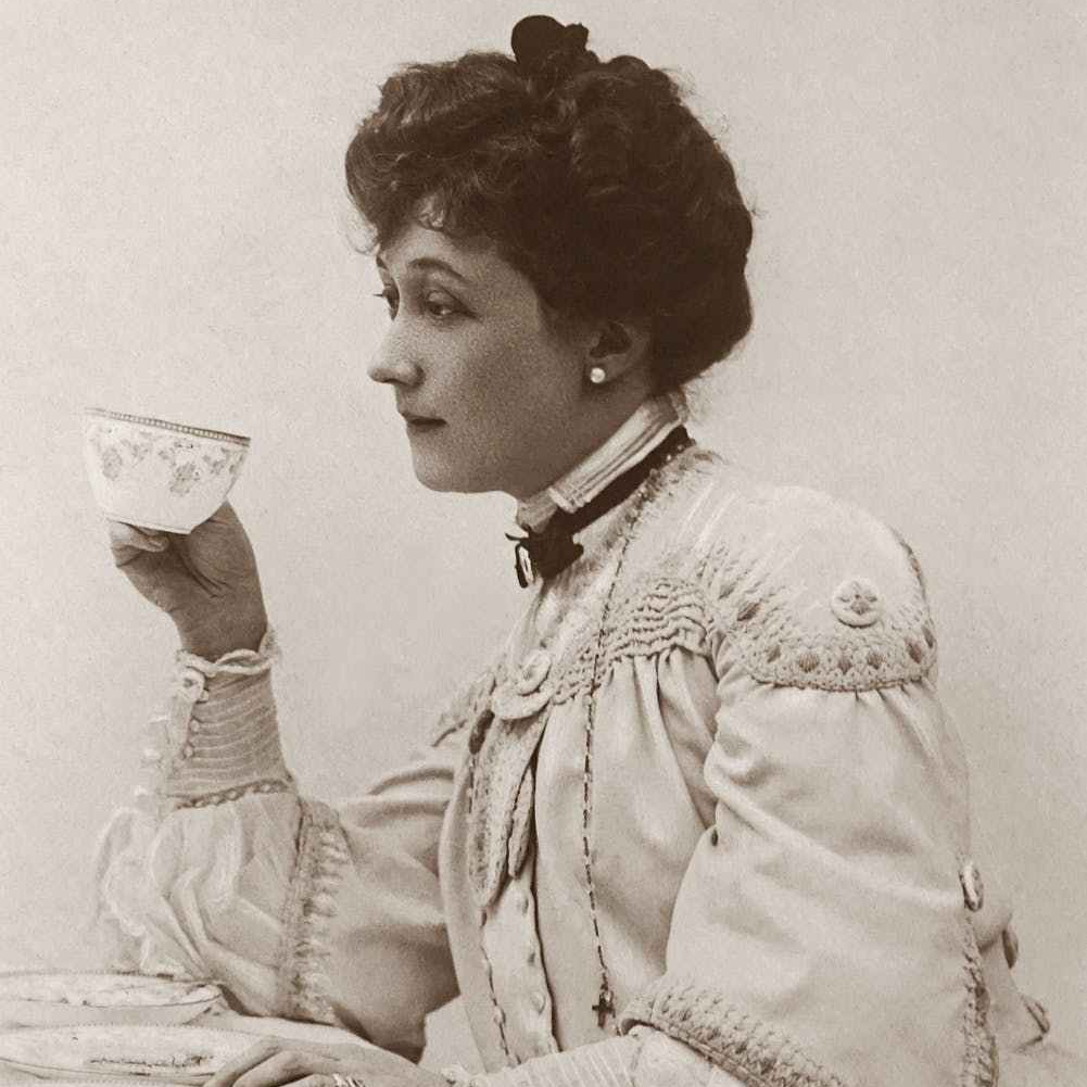 classic photo of a woman holding a tea cup