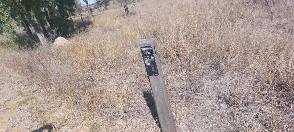 Shows the 81 kilometre marker for the rail trail