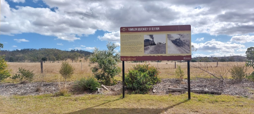 Shows the Yimbun station marker with historical information